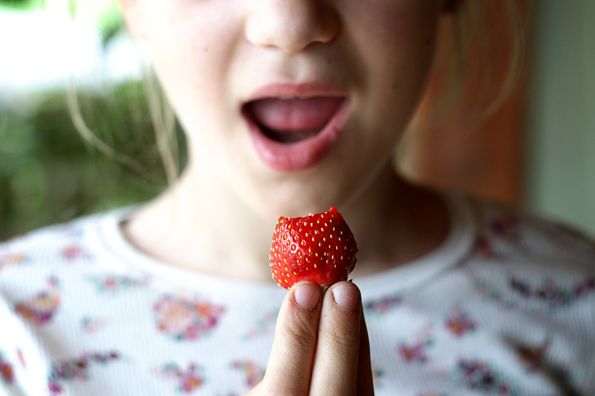 eating strawberry